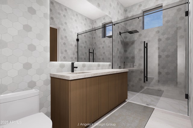 bathroom with tile walls, toilet, vanity, tiled shower, and wallpapered walls