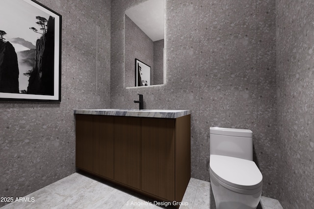 bathroom with toilet, tile patterned flooring, and vanity