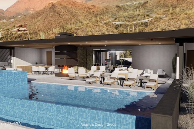 view of pool with a mountain view and a patio