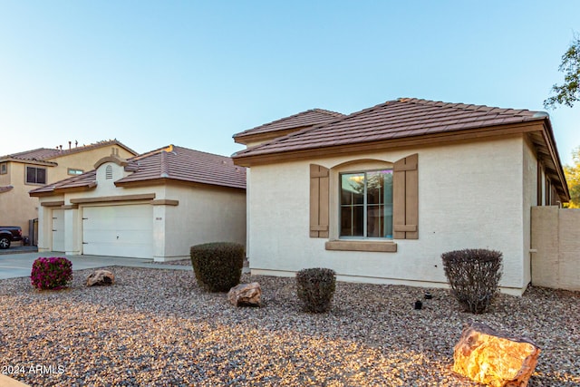 view of front of house with a garage