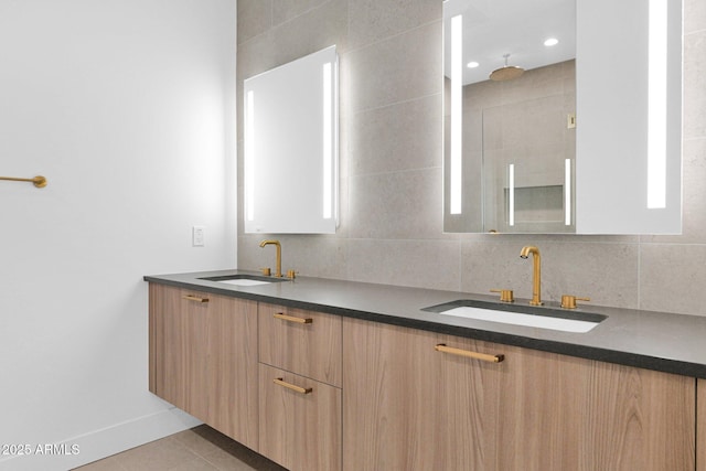 19355 N 73rd Way Unit 4002, Scottsdale, AZ 85255 - bathroom featuring double vanity, a tile shower, tile patterned floors, and a sink