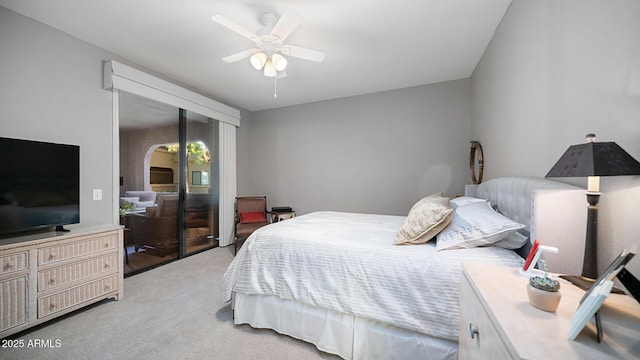 15252 N 100th St Unit 1134, Scottsdale, AZ 85260 - bedroom featuring light carpet, a closet, and a ceiling fan