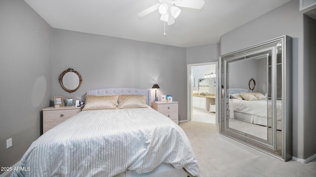 15252 N 100th St Unit 1134, Scottsdale, AZ 85260 - bedroom with carpet, a ceiling fan, and connected bathroom