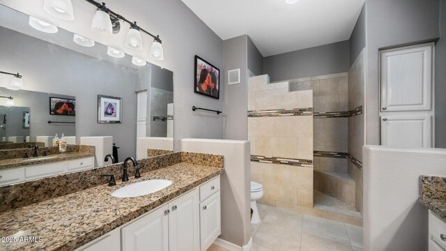 15252 N 100th St Unit 1134, Scottsdale, AZ 85260 - full bath with walk in shower, vanity, tile patterned flooring, and toilet