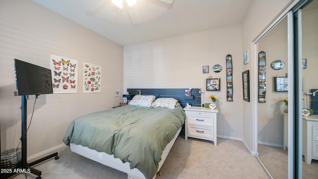 15252 N 100th St Unit 1134, Scottsdale, AZ 85260 - bedroom with light colored carpet, baseboards, and ceiling fan