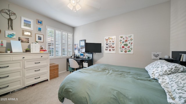 15252 N 100th St Unit 1134, Scottsdale, AZ 85260 - bedroom with light colored carpet, baseboards, and ceiling fan