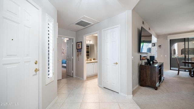 15252 N 100th St Unit 1134, Scottsdale, AZ 85260 - hallway featuring baseboards and light tile patterned floors