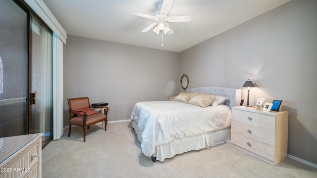 15252 N 100th St Unit 1134, Scottsdale, AZ 85260 - bedroom with light carpet, ceiling fan, a closet, and baseboards