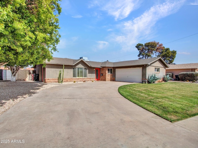 ranch-style home featuring brick siding, stucco siding, concrete driveway, a garage, and a front lawn