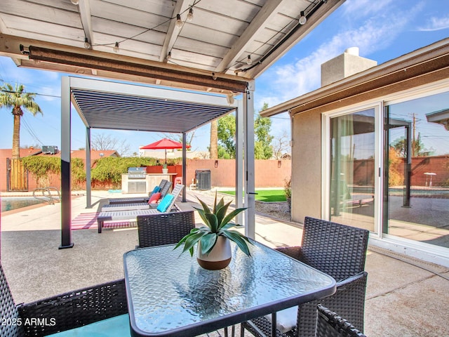 view of patio with outdoor dining space, cooling unit, and fence private yard