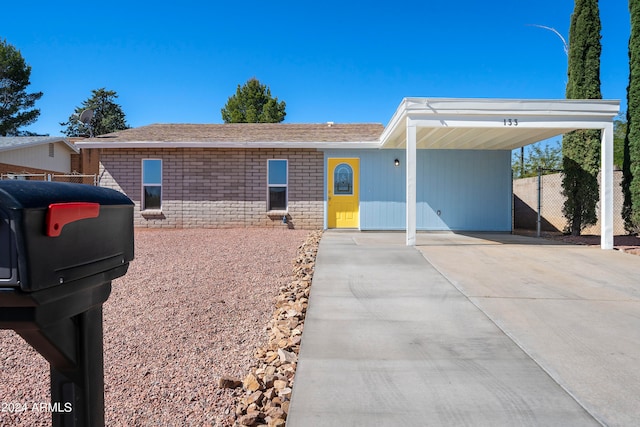 view of front of house with a carport