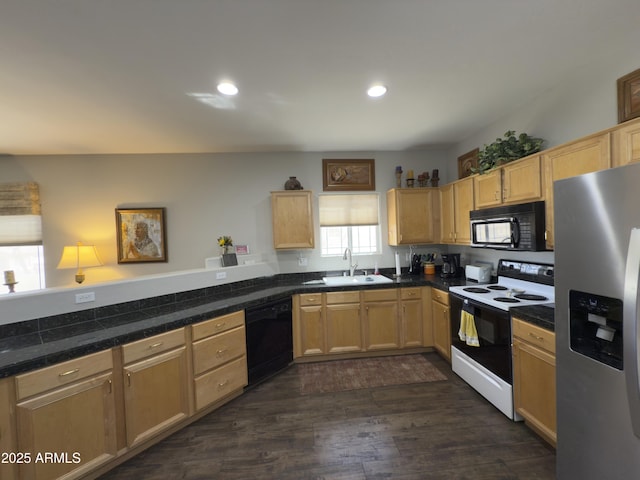 kitchen featuring black appliances, light brown cabinets, dark wood-type flooring, and a sink