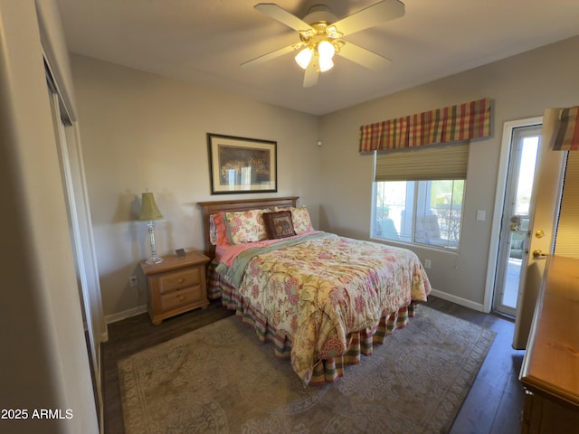 bedroom featuring wood finished floors, baseboards, a closet, and ceiling fan