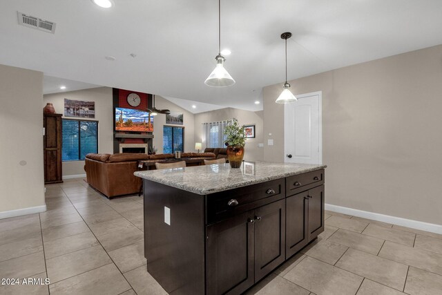 15019 N Mayflower Dr, Fountain Hills, AZ 85268 - kitchen featuring baseboards, pendant lighting, a fireplace, light tile patterned floors, and recessed lighting