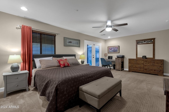 carpeted bedroom featuring french doors, access to outside, and ceiling fan