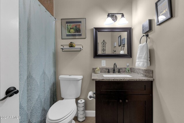 15019 N Mayflower Dr, Fountain Hills, AZ 85268 - bathroom featuring vanity, toilet, and baseboards