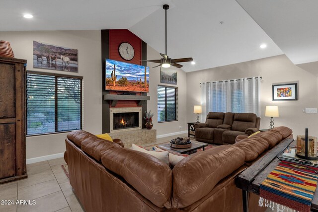 15019 N Mayflower Dr, Fountain Hills, AZ 85268 - living room featuring baseboards, a ceiling fan, high vaulted ceiling, a brick fireplace, and light tile patterned floors