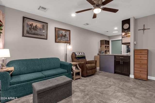 living room featuring ceiling fan