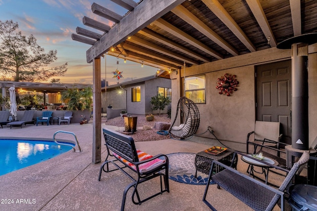 patio terrace at dusk with a pergola