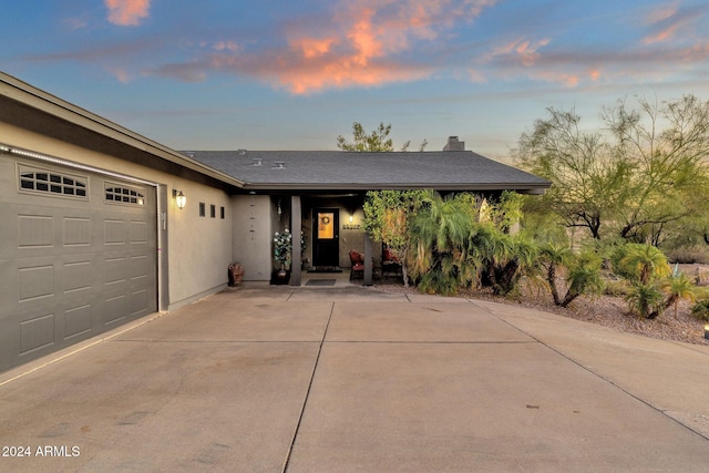 view of front of property with a garage