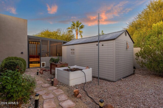 15019 N Mayflower Dr, Fountain Hills, AZ 85268 - view of patio / terrace with a sunroom and a vegetable garden