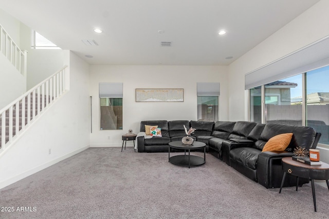 living room featuring light colored carpet