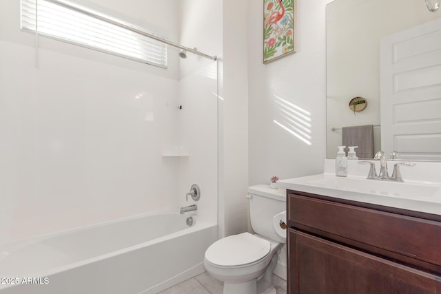 full bathroom with shower / washtub combination, vanity, tile patterned floors, and toilet