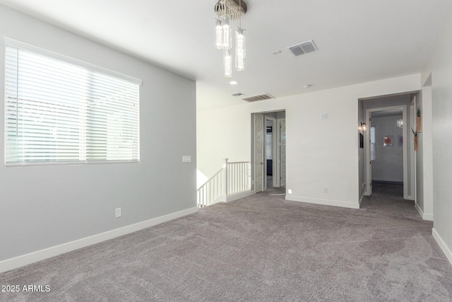 view of carpeted spare room