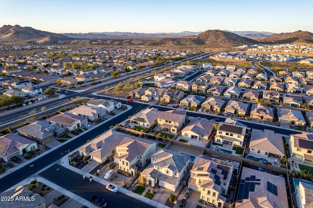 birds eye view of property featuring a mountain view