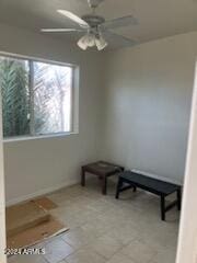 unfurnished room with ceiling fan