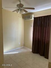 spare room featuring ceiling fan