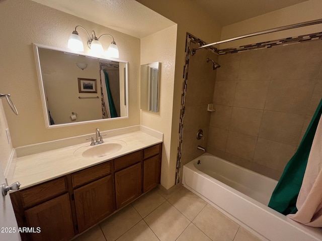 bathroom featuring tile patterned floors, shower / bath combo, and vanity