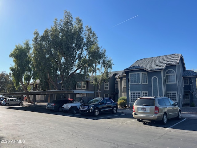 exterior space featuring a carport