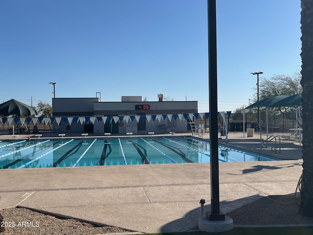 view of swimming pool featuring a patio