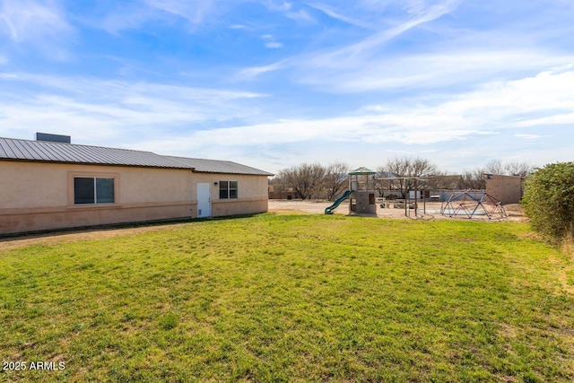 view of yard with a playground