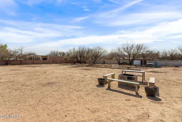 view of community featuring fence