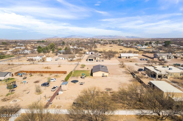 drone / aerial view featuring a mountain view