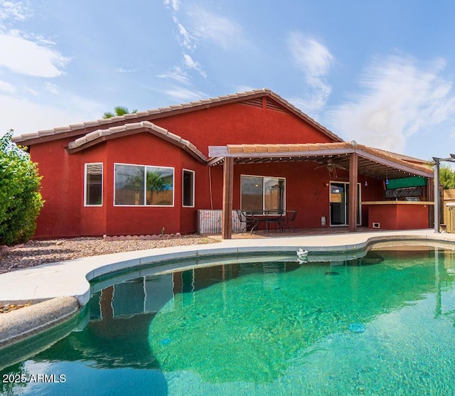 pool featuring a patio area and a pergola