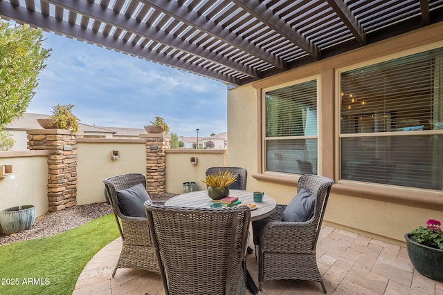 view of patio featuring a pergola