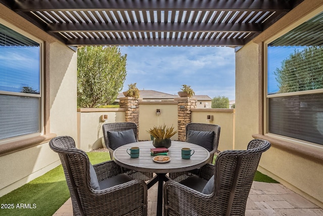 view of patio featuring a pergola