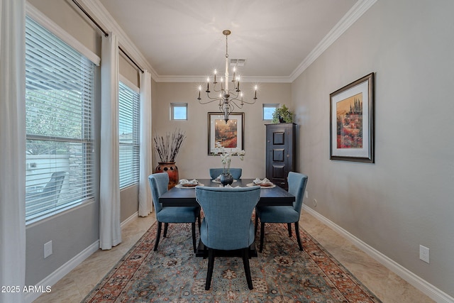 dining area featuring ornamental molding and a chandelier