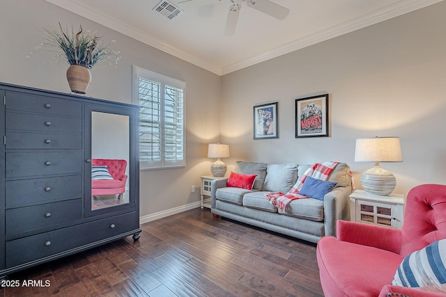 living room featuring ceiling fan, ornamental molding, and dark hardwood / wood-style flooring