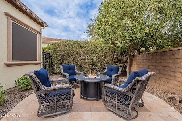 view of patio featuring a fire pit