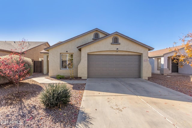 single story home featuring a garage