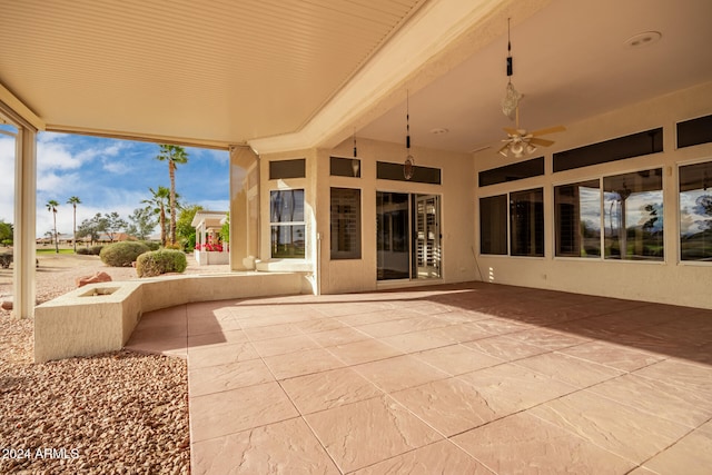 view of patio / terrace featuring ceiling fan