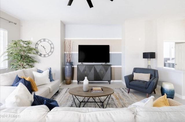 living room featuring ceiling fan