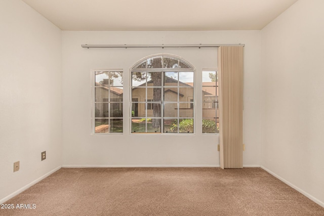 8140 N 107th Ave Unit 287, Peoria, AZ 85345 - carpeted empty room featuring baseboards