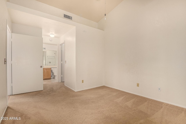 8140 N 107th Ave Unit 287, Peoria, AZ 85345 - spare room featuring light carpet and baseboards