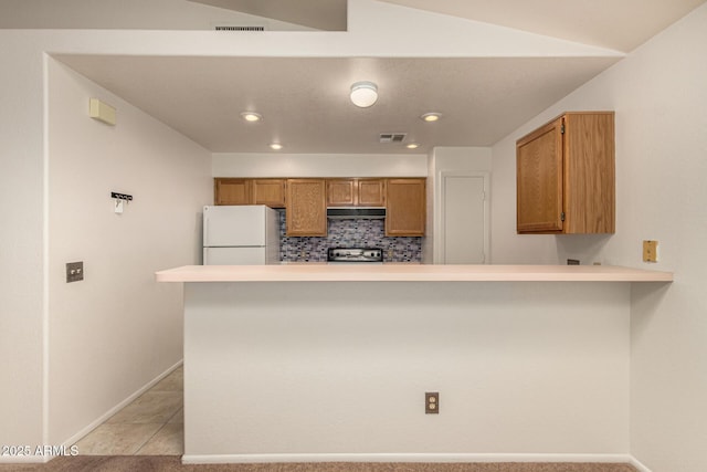 8140 N 107th Ave Unit 287, Peoria, AZ 85345 - kitchen with freestanding refrigerator, baseboards, range, light countertops, and recessed lighting