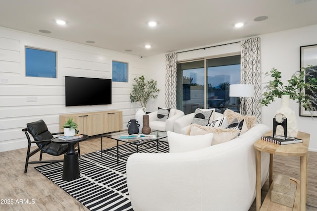 living room with light hardwood / wood-style floors